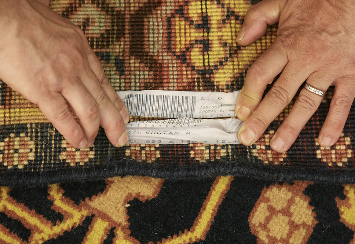 A Kalleh Khotan Antique Carpet (655x190 cm)